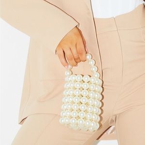 Bead Pearl bag 
Very cute and chic 🤩

Fits essentials- like phone, lipstick